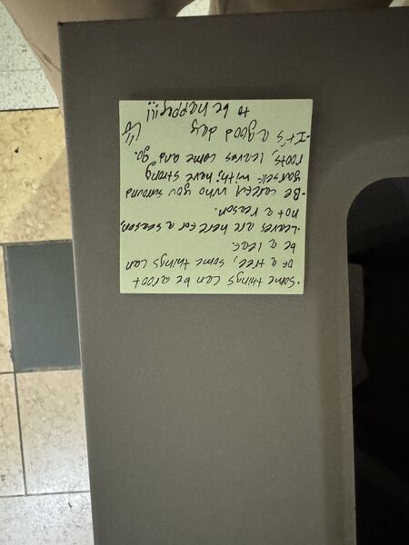 Handwritten sticky note with words of encouragement